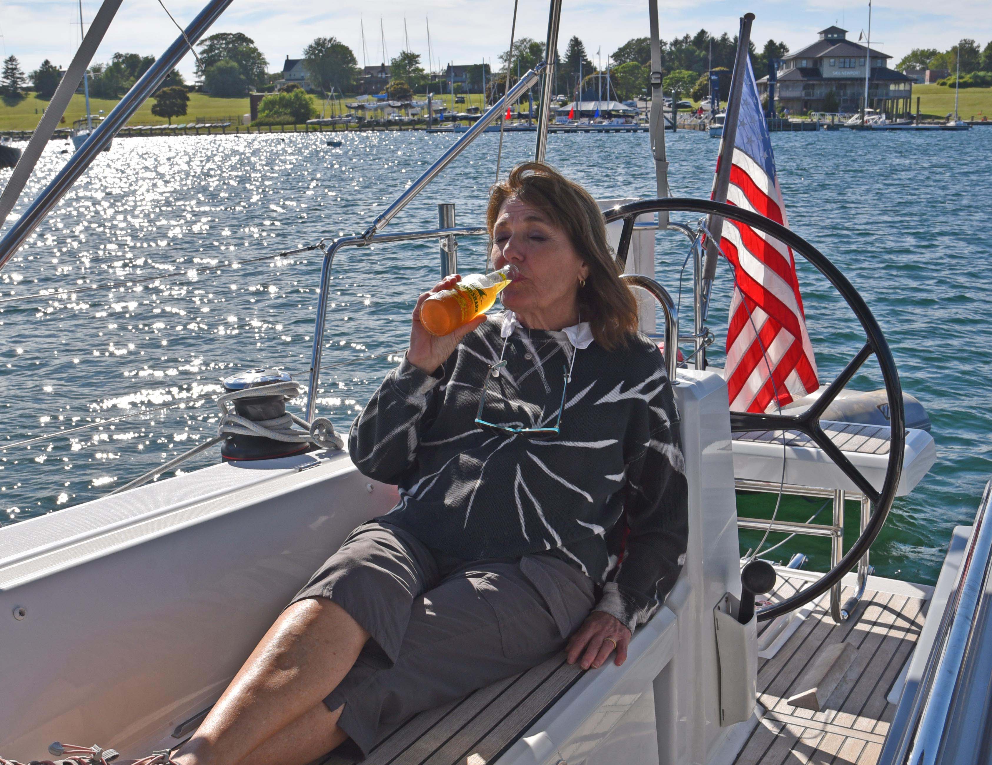 Woman in Cockpit with Beer